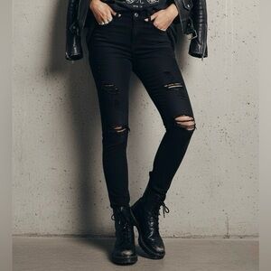FRAME LE SKINNY DE JEANNE Distressed Destroy Mid-Rise Skinny Jeans in Black Noir